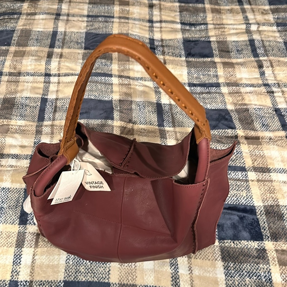 A beautiful brand new leather tote. Never used, original tags.